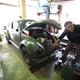 Here’s Victor pointing out some stock under-hood components like the original 20-liter gas can: Photo: Michael Tracy